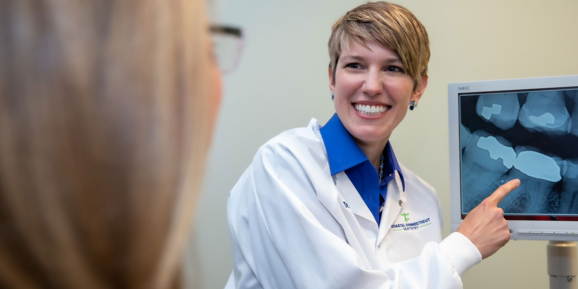 dr johndreau discussing dental procedure Waterford, CT